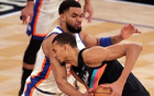 NBA总决赛首战尼克斯强势开局，文班亚马遭遇挑战，球队表现引发热议，球迷期待后续精彩对决